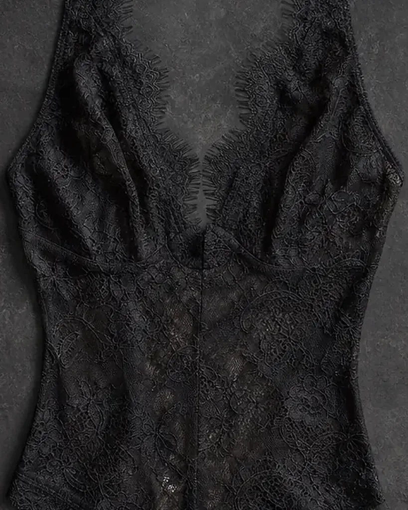 Close detail of the lace on the Velo Nero Plunge Bodysuit